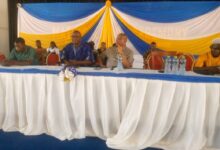 Panelists seated during the summit