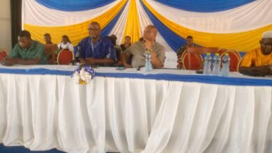 Panelists seated during the summit