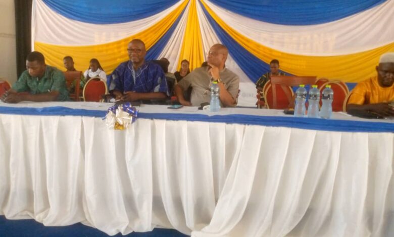 Panelists seated during the summit