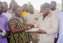 Alhassan Tampuli presenting the donations to GES and GHS Directors