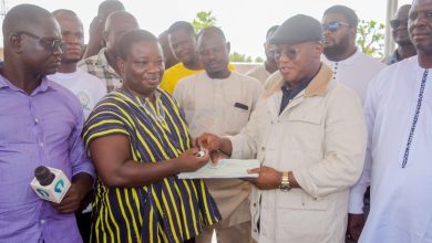 Alhassan Tampuli presenting the donations to GES and GHS Directors