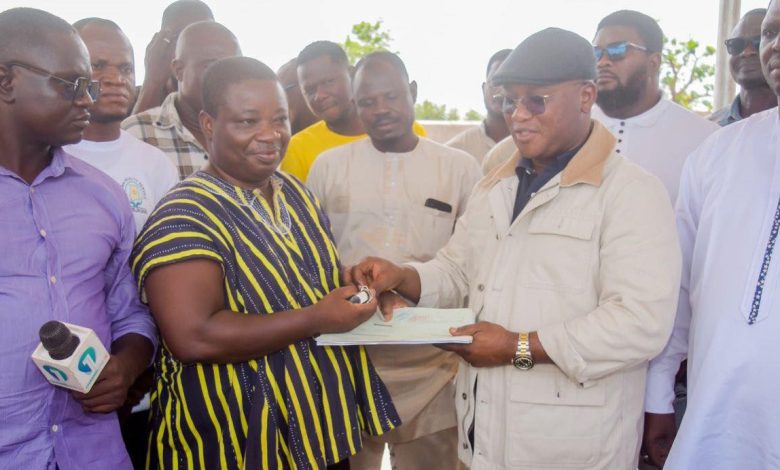 Alhassan Tampuli presenting the donations to GES and GHS Directors