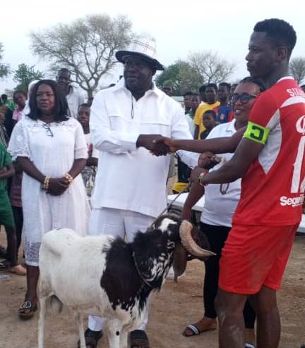 Lawyer Charles Bawadua Adongo presents a goat to Namoo Zone