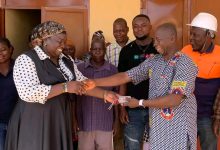 KNM MCE, Faustina Abulu handing-over the facility to Thomas Kanlisi, the Municipal Education Director.