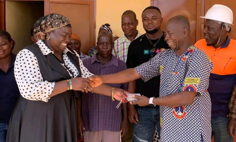 KNM MCE, Faustina Abulu handing-over the facility to Thomas Kanlisi, the Municipal Education Director.