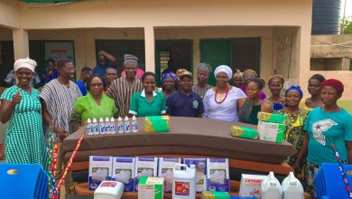 Pog-nab Hajia Comfort Akantua in a group picture with staff of the facility.