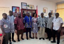 A group photo of GNAT representatives with Akumugri Atanga