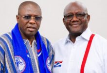 A picture of Amin Adam with Paul Afoko